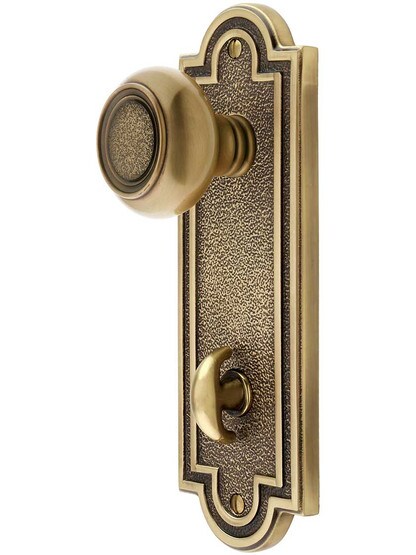Belmont Door Set with Matching Knobs and Thumb Turn with in Antique Brass.